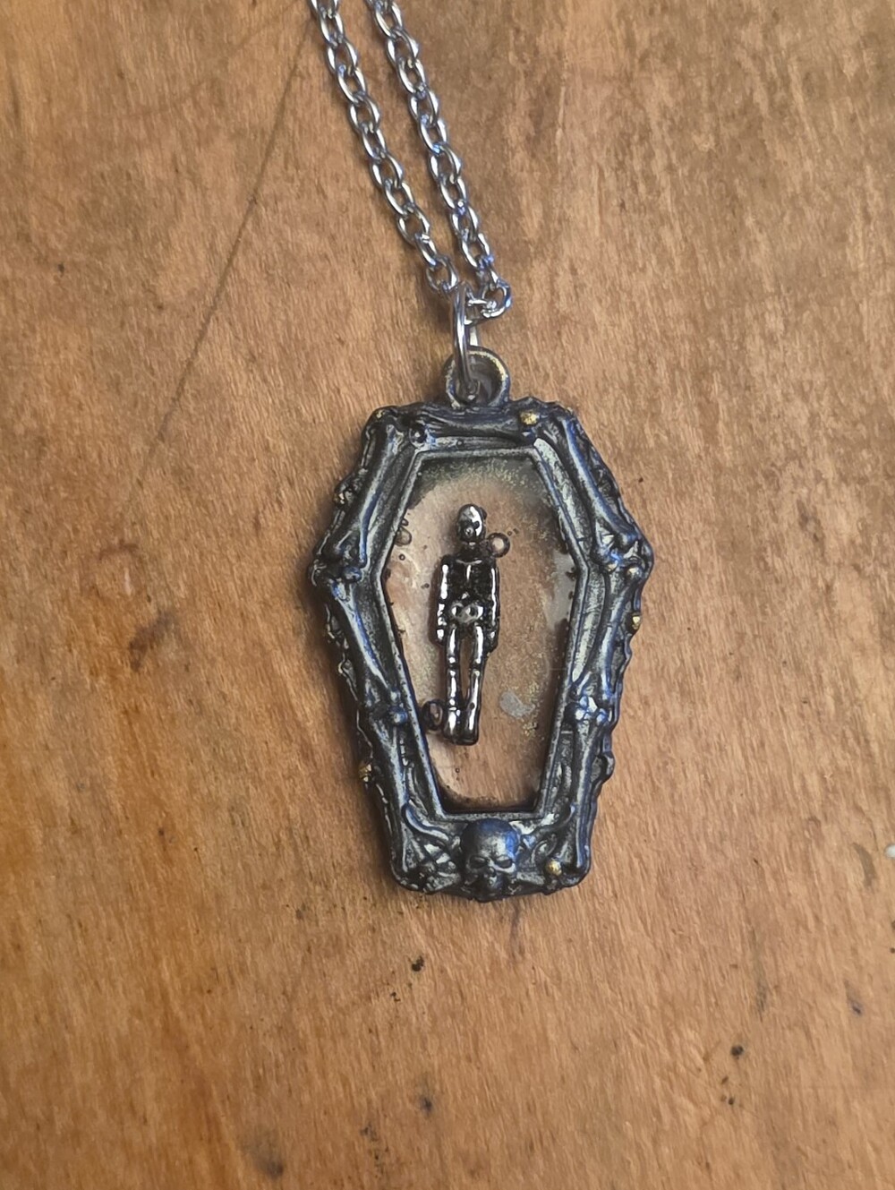 Coffin Adorned With Bones & Skeleton Inside On Silver Tone Chain Necklace